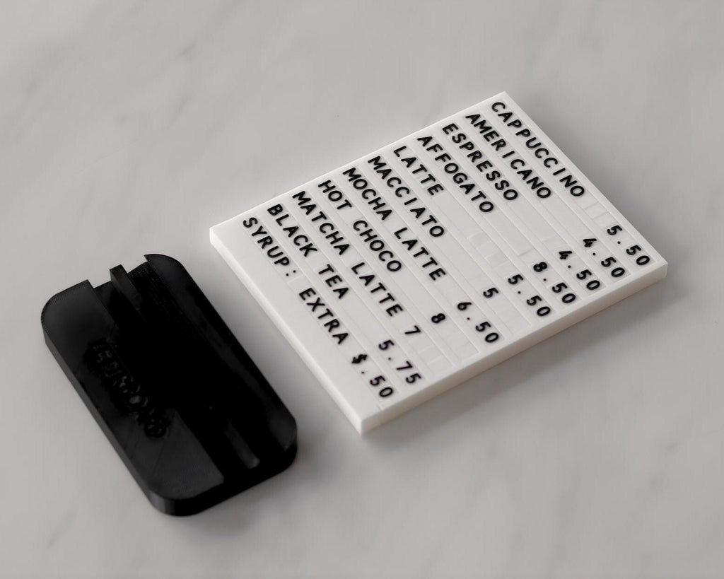 Two LettrBoard tabletop menu signs with dual-angle bases and character sheet