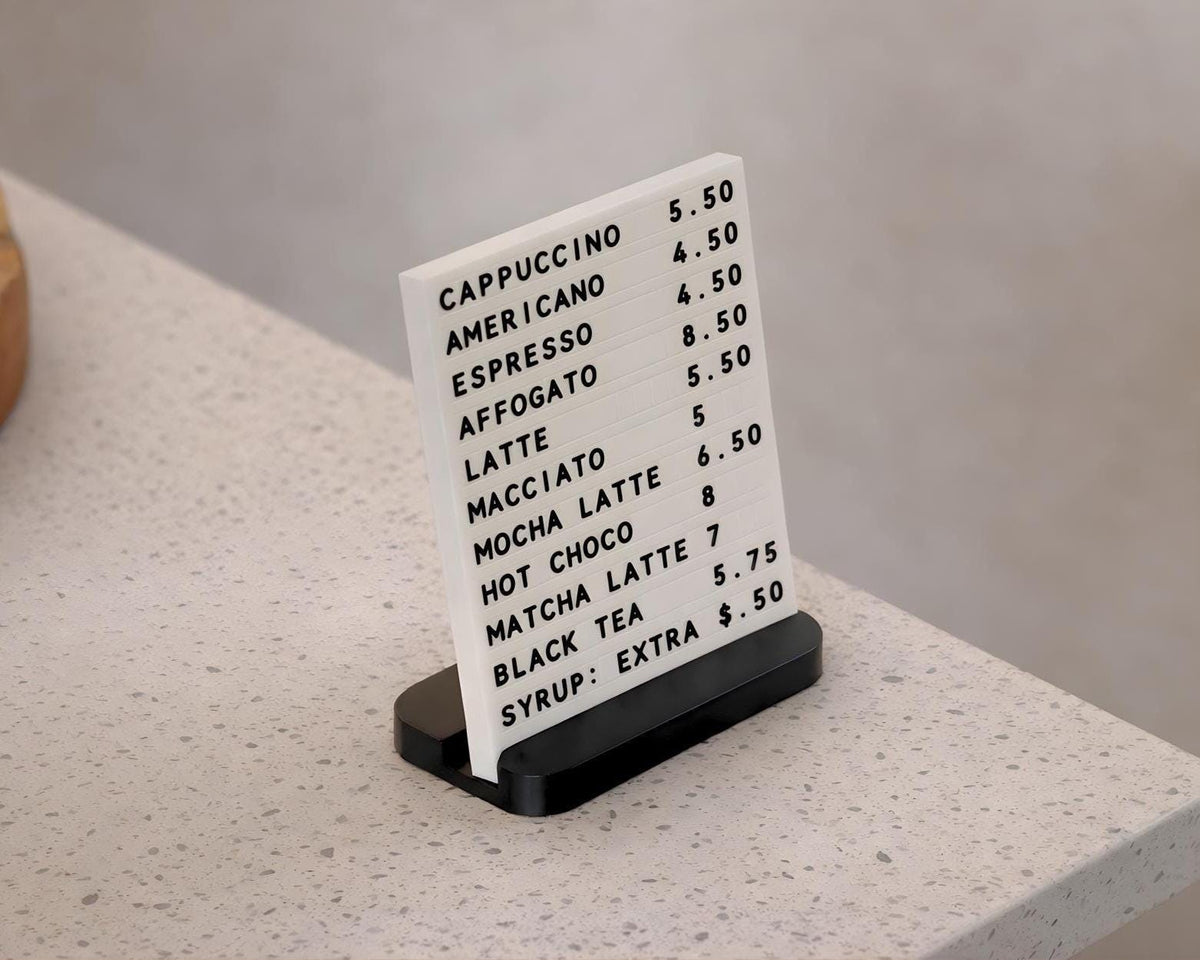 LettrBoard changeable tabletop coffee menu sign on a marble counter