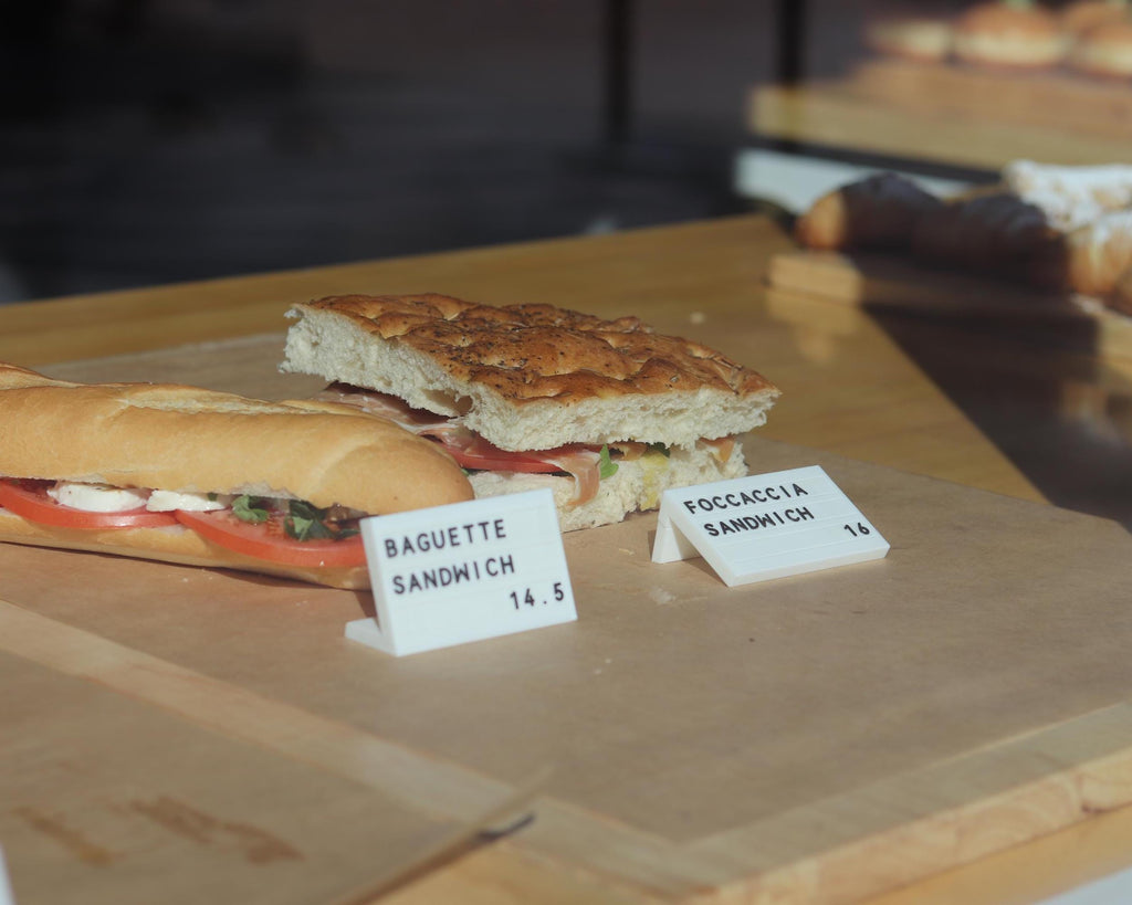 LettrBoard counter signs labeling sandwiches and savory pastries