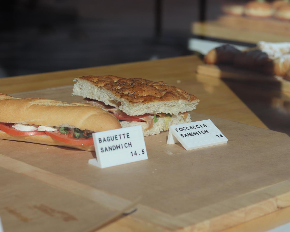 LettrBoard counter signs labeling sandwiches and savory pastries