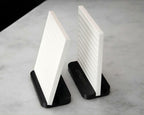 LettrBoard tabletop menu signs standing upright and tilted on black dual-angle bases